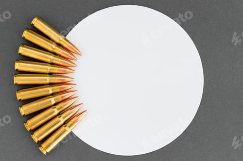 Preview: Bullets next to white circle on gray background. Cartridges 7.62 caliber