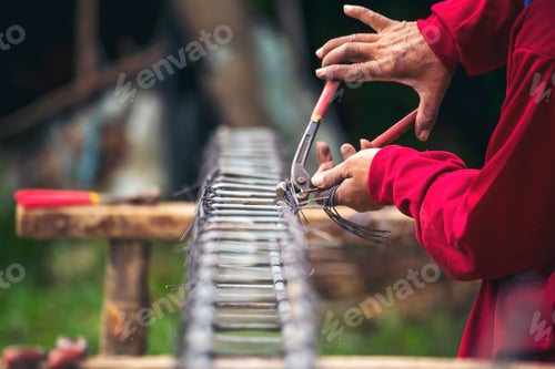 Preview: Construction Worker hands using Welding machinery iron metal sparking. Men hands protective glove