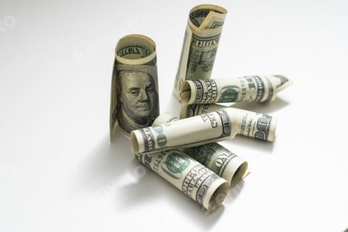 Preview: a role-dollar bills in front of white background