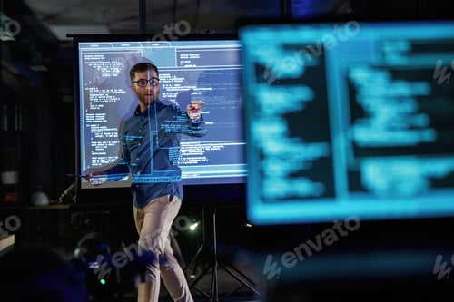 Preview: Laptop in the front. Business coach against projector with data