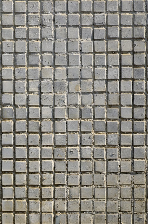 Preview: The texture of the old concrete wall, with a coating of shallow tiles of square shape