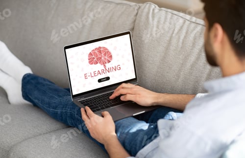 Preview: Remote Study. Man Browsing E-Learning Website On Laptop, Having Online Lesson