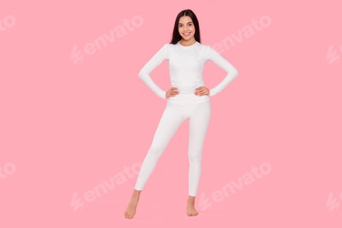 Preview: Woman in warm thermal underwear on pink background
