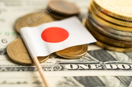 Preview: Stack of coins with Japan flag and US dollar banknotes.