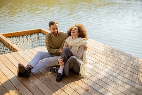 Preview: Joyful moments by the river with laughter and connection on a sunny afternoon