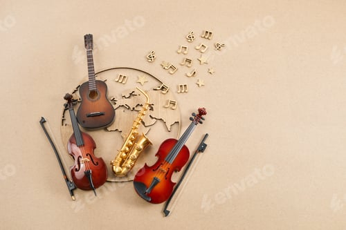 Preview: Happy world music day. Musical instruments with globe background.