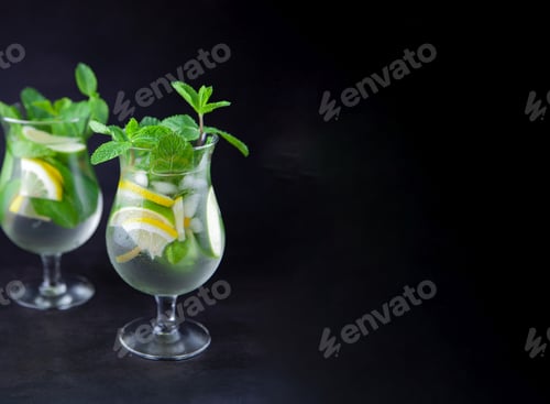 Preview: Refreshing Citrus Drinks with Mint on Dark Background