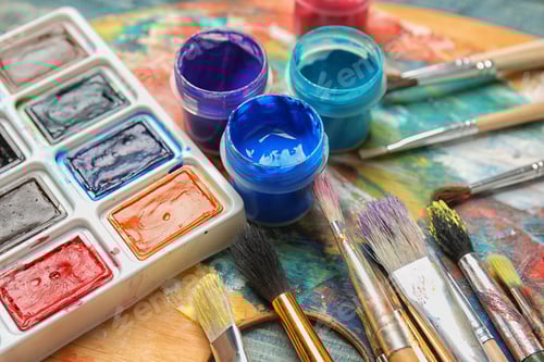 Preview: Colorful Paint and Brushes on Artistic Wood Palette