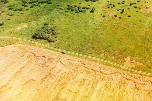 Preview: Aerial View Of Car SUV Parked Near Countryside Road In Summer Field Rural Landscape. Yellow Wheat
