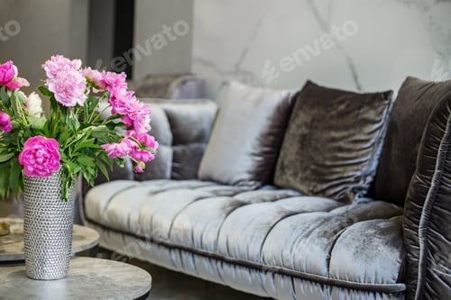 Preview: A bouquet of pink peonies in the interior. Beautiful modern interior and fresh flowers