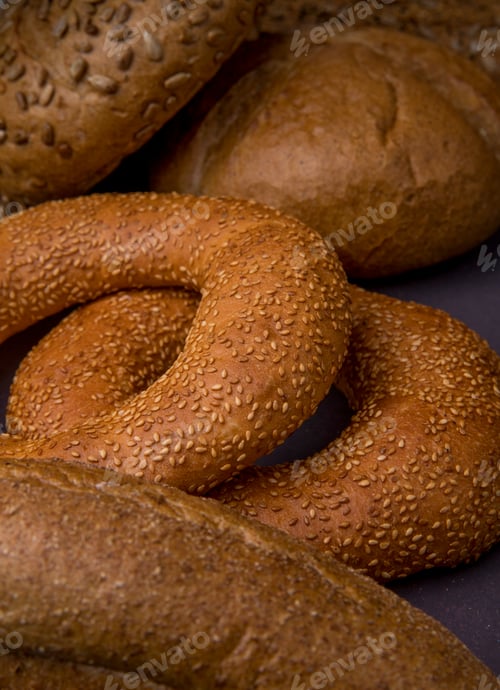 Preview: close-up view of bagels with seeded baguette and cob breads