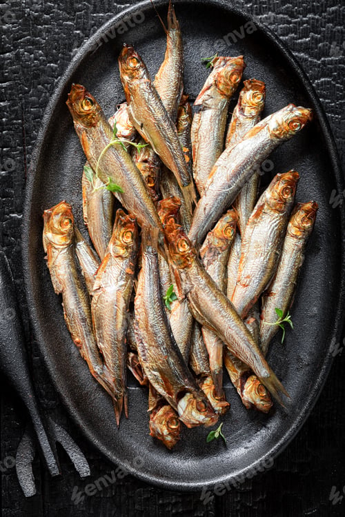 Preview: Tasty and salty smoked sprats as popular mediterranean food.