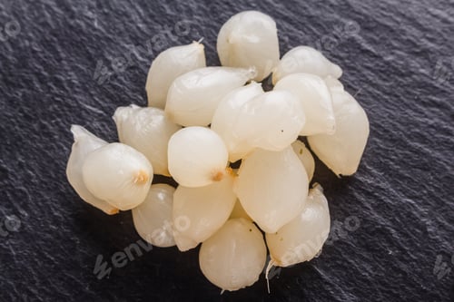 Preview: pickled vegetables on a dark stone background