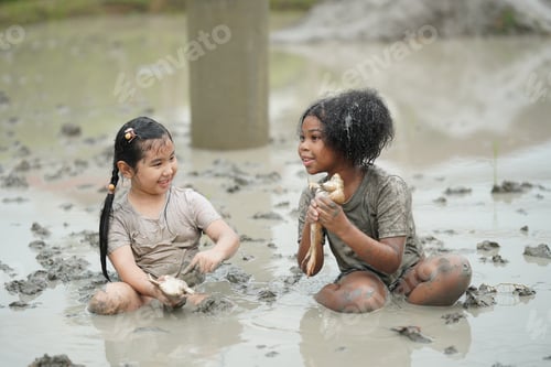 Preview: Group of happy children playing at playground