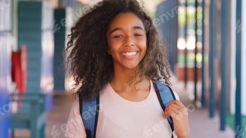 Preview: Portrait Of Smiling Female High School Student Standing Outside College Building
