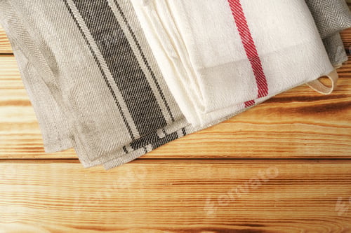 Preview: Kitchen towel or napkin over the wooden table.