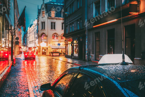 Preview: Taxi Car Wait Clients In Old European Streets In Rainy Evening.