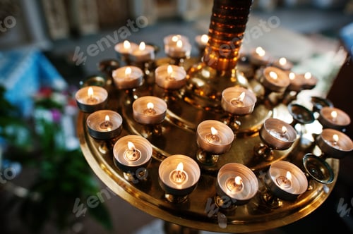 Preview: Close-up photo of candles in the church.