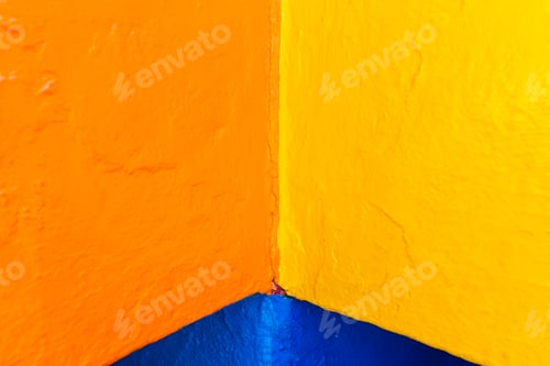 Preview: Abstract background of variable geometry and intense yellow and blue colors.