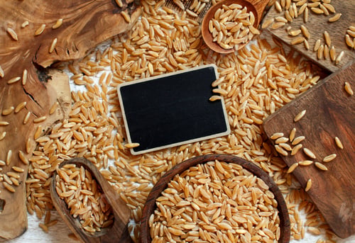 Preview: Raw Kamut grain with a small chalkboard