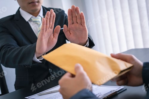 Preview: Businessman or accountant is rejecting and resisting partner bribery deals in joint financial settle