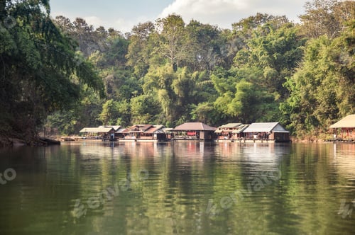 Preview: Wooden raft building on river kwai in tropical rainforest at Kanchanaburi