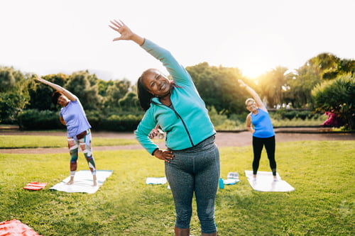 Preview: Senior sport people exercising during yoga workout class outdoor at park city - Fitness elderly