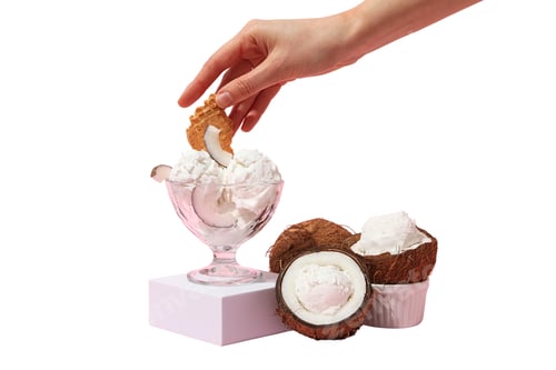 Preview: Scoop of coconut ice cream topped with cookie, on white