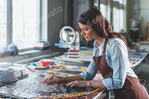 Preview: Young woman in uniform with mosaic