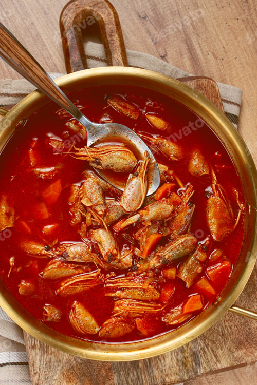 Preview: French shrimp bisque soup, in a pot, close-up, no people,