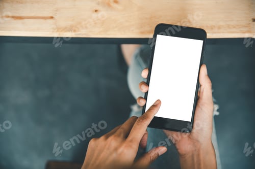Preview: Asian business woman hand using and touching smart phone with white blank empty screen.