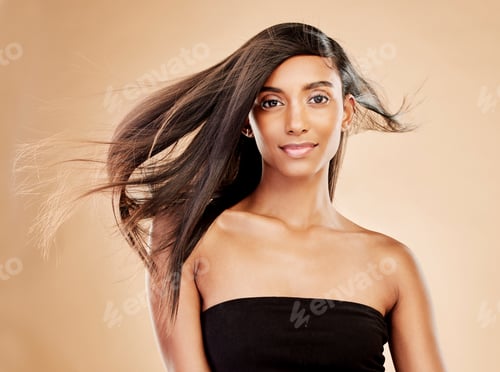 Preview: Woman, portrait and hair care for beauty salon, cosmetics or treatment against a studio background.