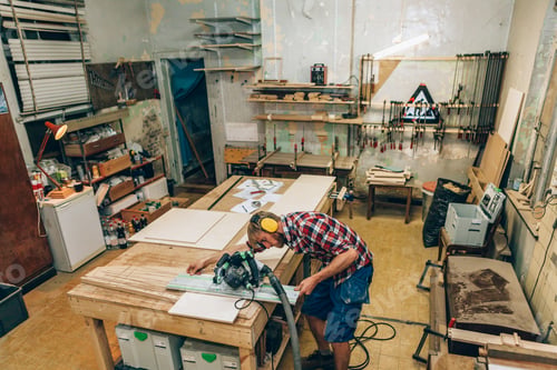 Preview: carpenter at work in his workshop