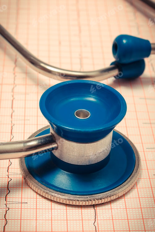 Preview: Medical stethoscope lying on electrocardiogram graph report. Healthy lifestyles