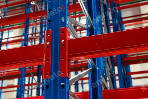 Commercial huge empty distribution warehouse with high racking