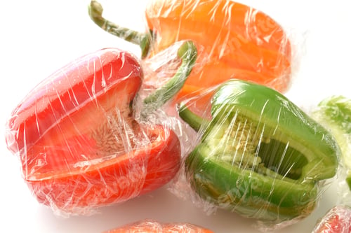 Preview: Bell pepper with cling film or plastic food wrap.