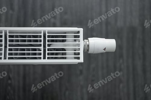Preview: Radiator heating controller banner close-up in modern interior