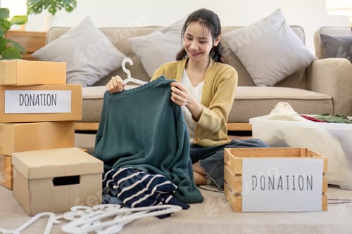 Preview: Volunteer Sorting and Donation Clothes for Charity - Community Service and Generosity in Action