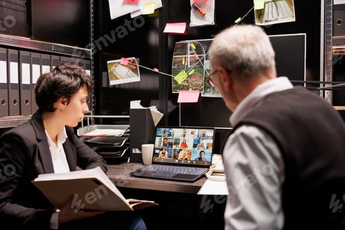Preview: Private detectives having online videocall with remote team