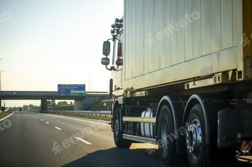 Preview: Long vehicle trailer truck on a highway.