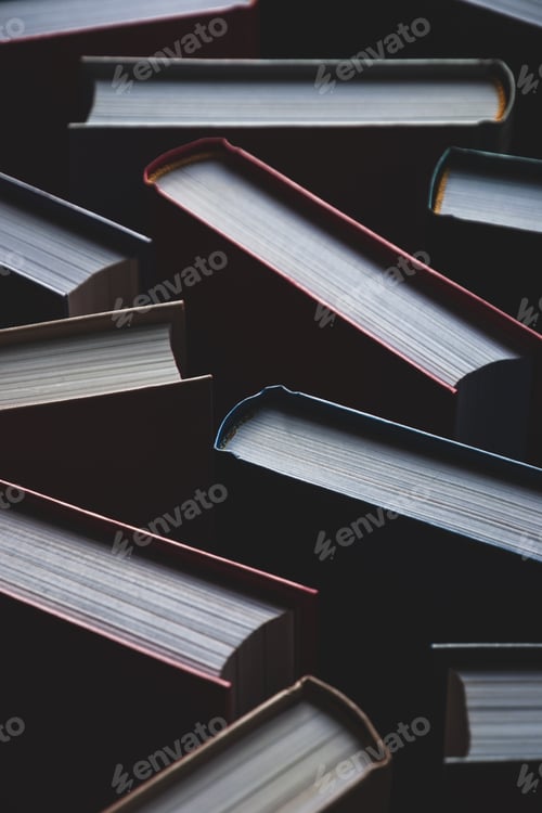 Preview: Background of books in hardcovers, full-frame texture, vertical shot