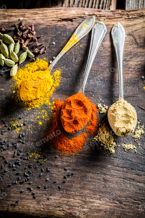 Preview: Fresh herbs and spices on old table