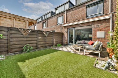 Preview: Minimalistic bright and landscaped backyard with dining area