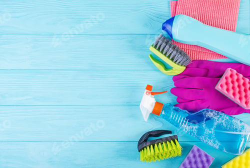 Preview: Cleaning service concept. Colorful cleaning set for different surfaces