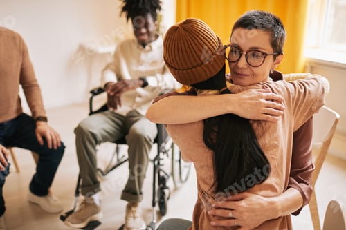 Preview: Women Embracing at Therapy Session