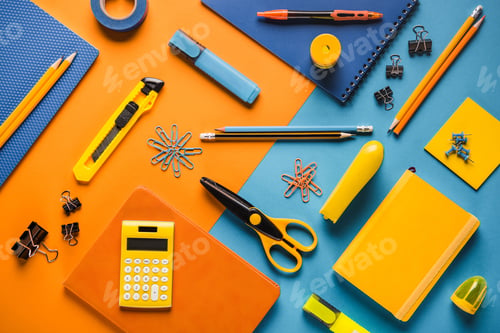 Preview: composition of orange and blue school supplies