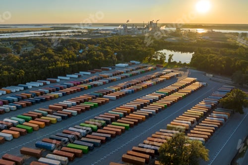 Preview: View from above of production line factory with large cargo container yard