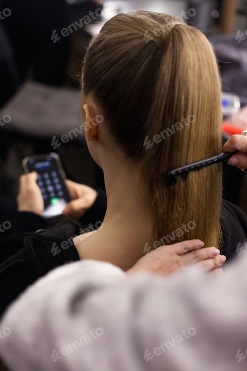 Preview: Young Woman Enjoys a Glamorous Makeover Experience at the Makeup Artist's Studio Indoors