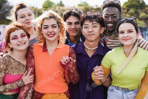 Preview: Group of young multiracial people wearing trendy retro style clothes while smiling on camera