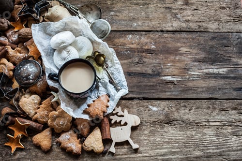 Preview: Christmas background. Cookies in the shape of Christmas trees. Food on a wooden table.